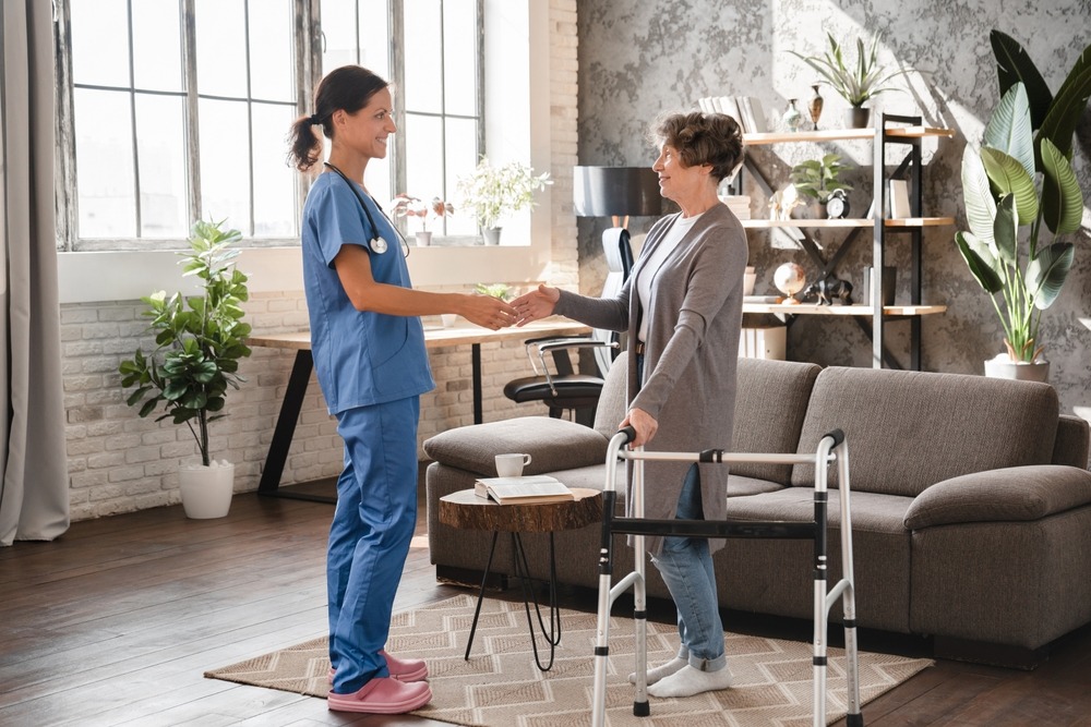 caregiver,nurse,caretaker,doctor,greeting,giving,handshake,to,senior,old
